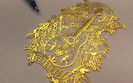Laser Cutting on Brass Guitar Art