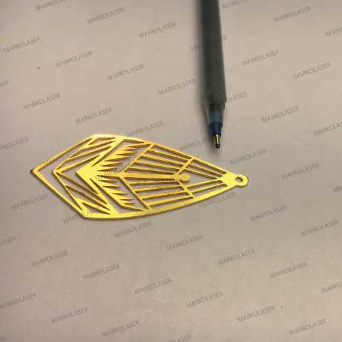 laser cutting on brass pendant art