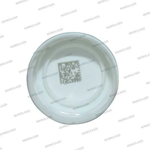 Laser marking on cap of bottle | Laser ablation (data-matrix code)|Laser ablation on bottle cap |Laser ablation on plastic | Laser ablation marking system |Laser Marking Automation | Laser marking machine | CO2 laser technology | Laser Engraving