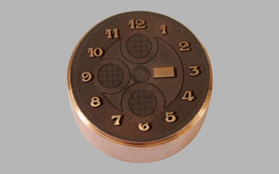 Copper EDM electrode with 3D laser-engraved watch dial for stamping dies, made on Markolaser URSA