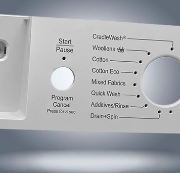 Laser colored marking on washing machine control panel